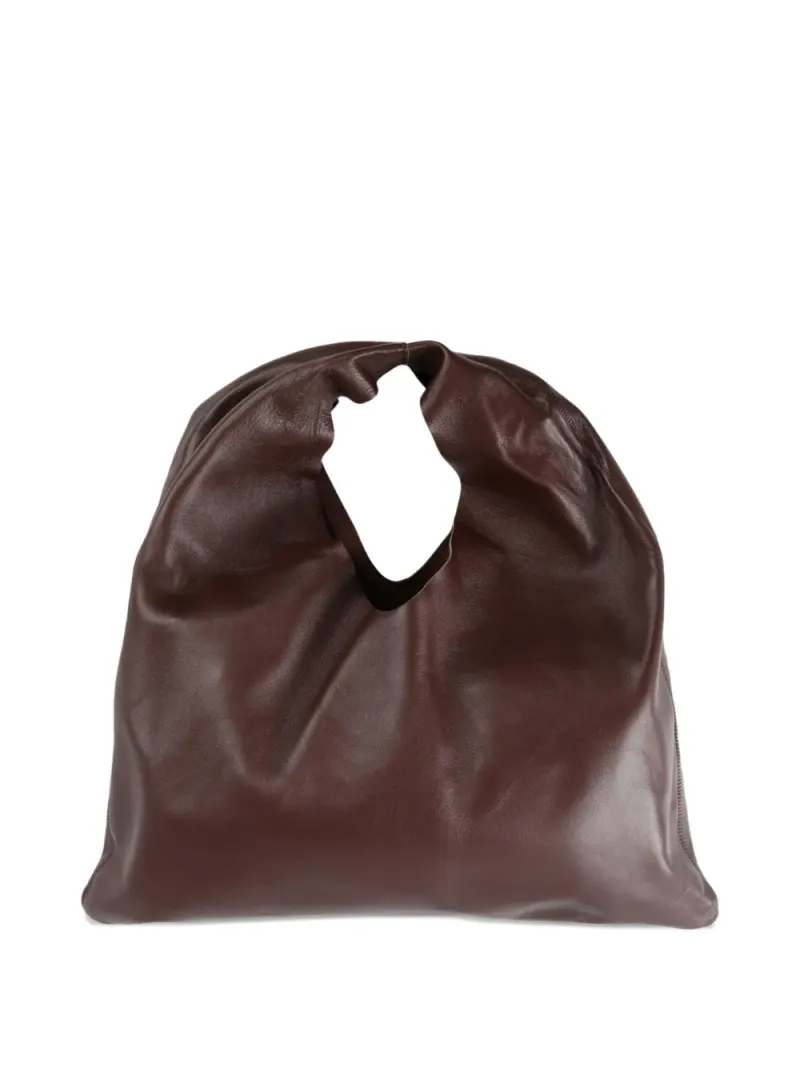 The Row draped leather tote bag in Braun
