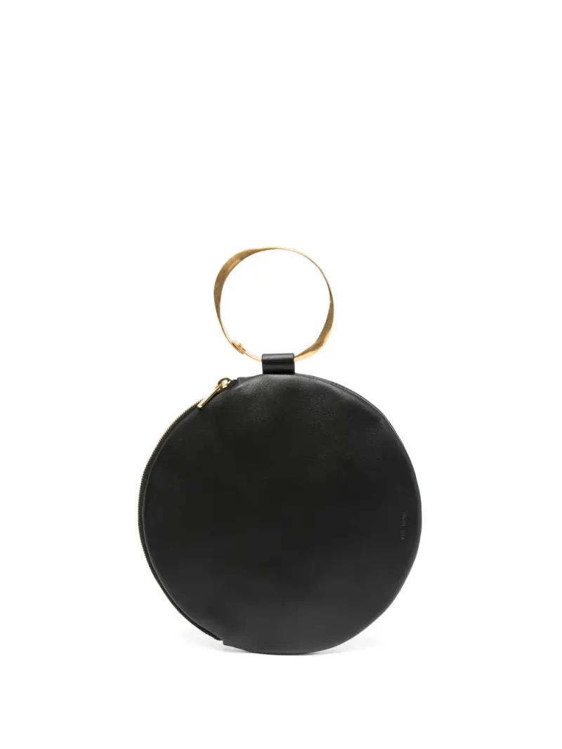 The Row Runde Bracelet Clutch in Schwarz